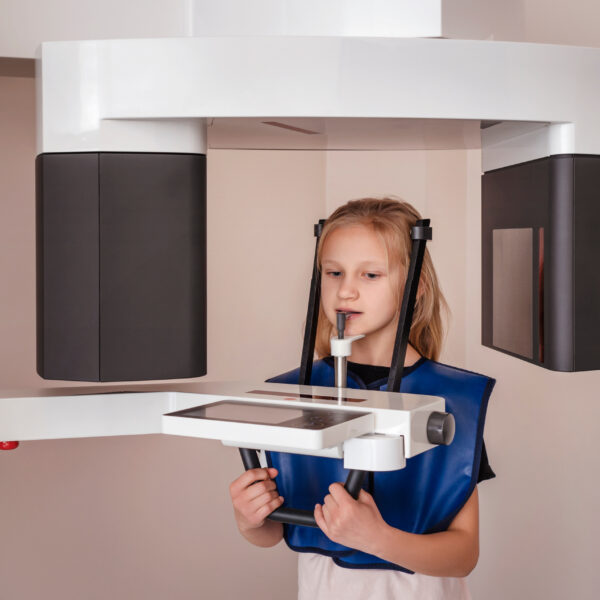 Orthopantomogram Digital image for Children OPG CT Scan X-Ray. Child Little Girl Make Panoramic single Image Radiograph Mandible, Maxilla and Teeth.