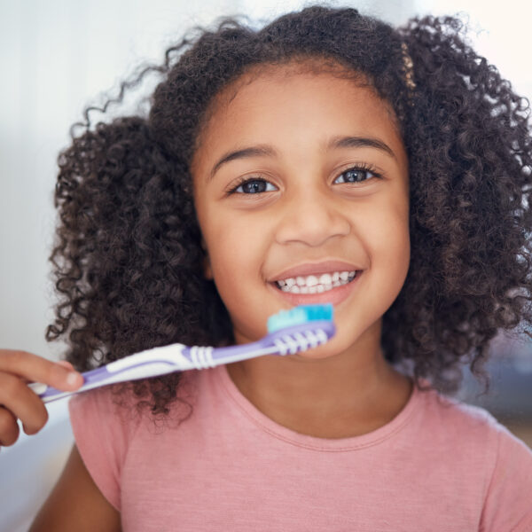 Young girl kids, portrait and brushing teeth, dental healthcare and bathroom toothbrush in Brazil home. Happy, smile and black child face cleaning mouth, healthy wellness development and fresh breath.